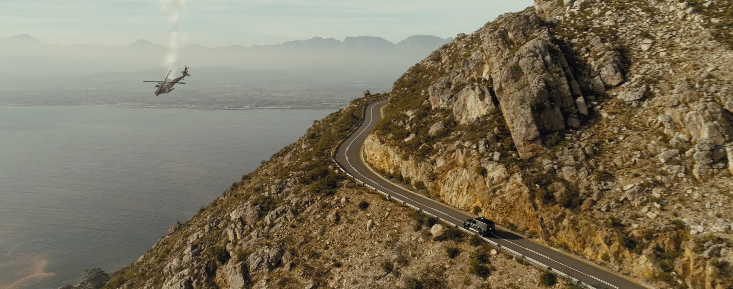 Driving on Steenbras Mountain Road while helicopter falls